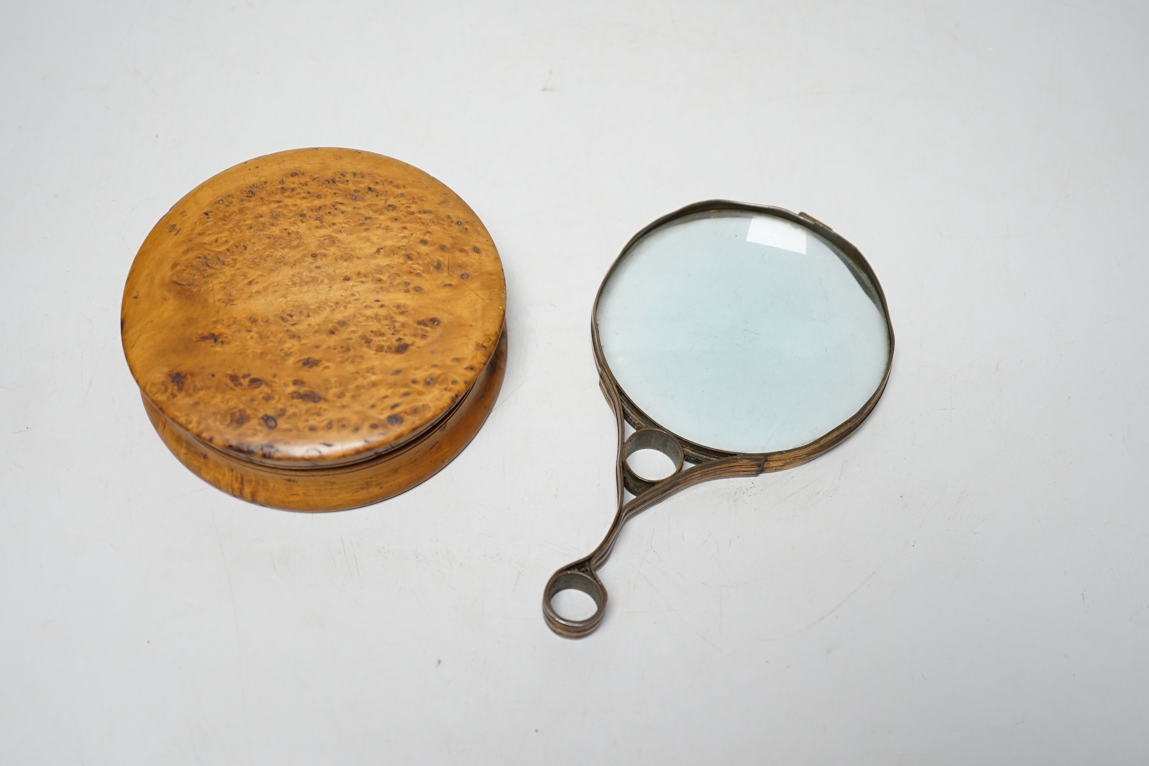 A 19th century burr walnut snuff box, a gilt brass magnifying glass and a Chinese pillow, the largest 31cm wide